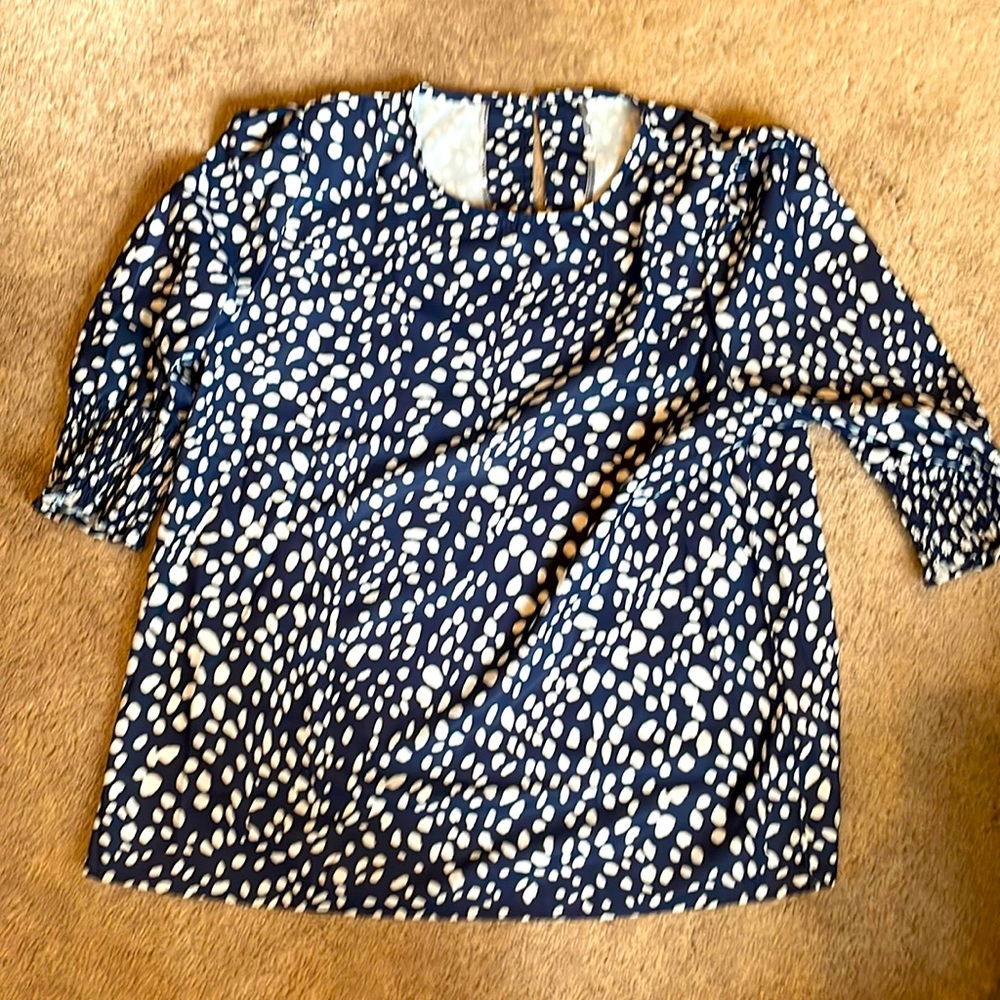 Button in back